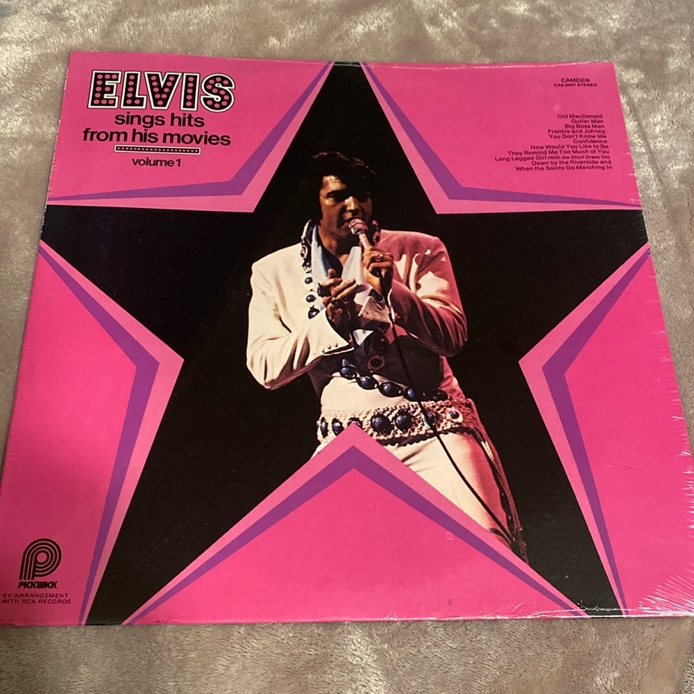 Elvis sings hits from his movies volume one vinyl record unopened.
